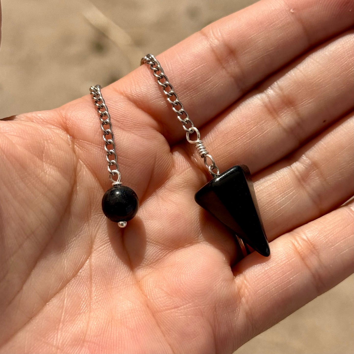 Péndulo de obsidiana